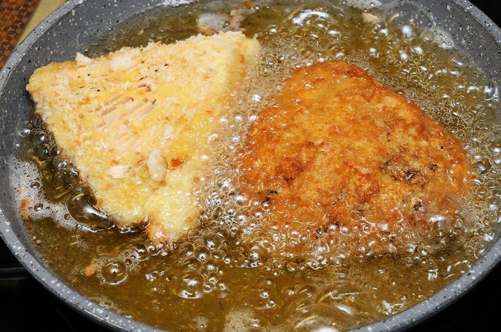 Parasole im Fett in einer Pfanne backen