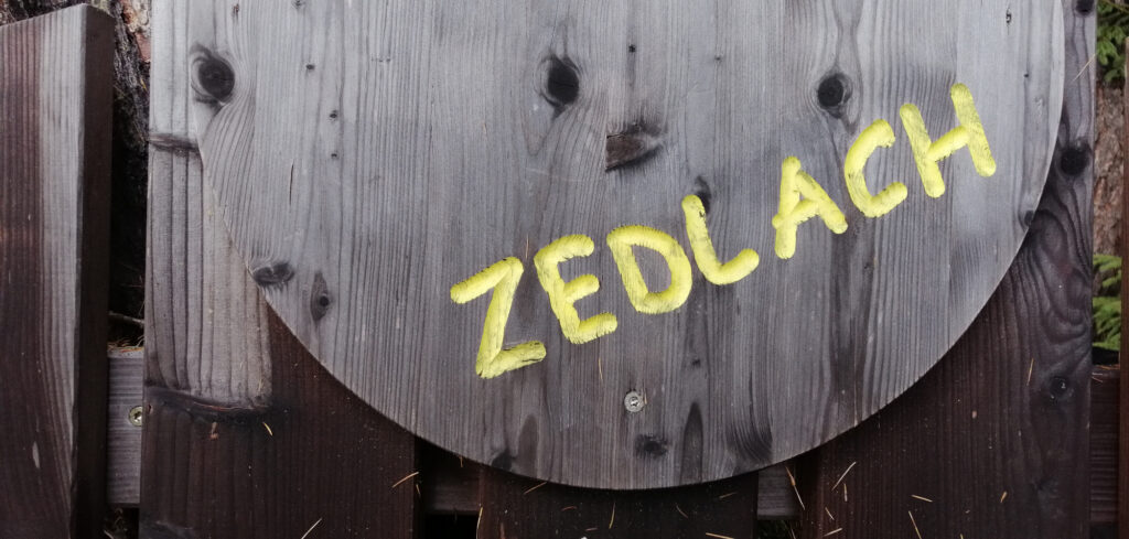 zedlacher-paradies-willkommensschild